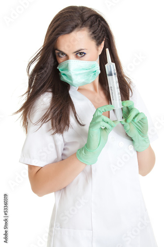 Photo: Doctor woman with medical syringe. young female doctor with syri Doctor woman with medical syringe. young female doctor with syri