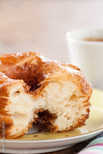 Photo: Croissant and doughnut mixture on a dish close-up Croissant and doughnut mixture on a dish close-up