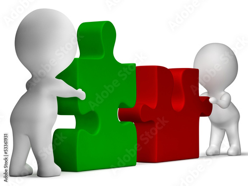 Illustration: Jigsaw Pieces Being Joined Showing Teamwork And Collaboration Jigsaw Pieces Being Joined Showing Teamwork And Collaboration
