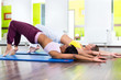 women in the gym doing yoga exercise for fitness
