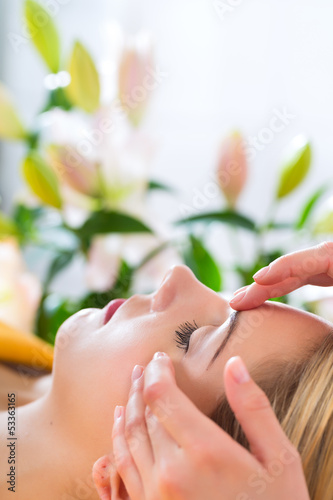 Photo: Wellness - woman getting head massage in Spa Wellness - woman getting head massage in Spa