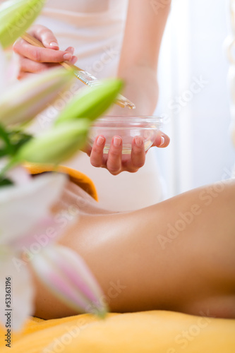 Photo: Wellness - woman getting body massage in Spa Wellness - woman getting body massage in Spa