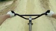 BMX biker jumping dirt jumps