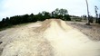 BMX biker jumping dirt jumps
