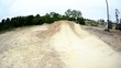 BMX biker jumping dirt jumps