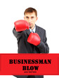 Businessman in boxing gloves isolated on white