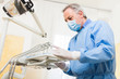 Dentist checking his tools