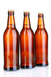 Photo: Beer bottles isolated on white Beer bottles isolated on white