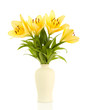 Photo: Beautiful orange lilies in vase, isolated on white Beautiful orange lilies in vase, isolated on white