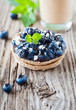 Foto: blaubeerküchlein und cappuccino blaubeerküchlein und cappuccino