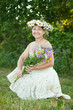 Photo: mature woman in camomile chaplet mature woman in camomile chaplet