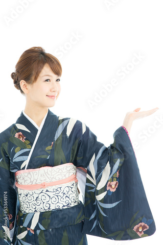 Photo: Beautiful japanese kimono woman isolated on white background Beautiful japanese kimono woman isolated on white background