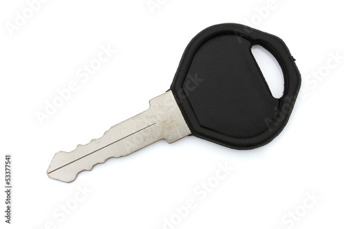 Photo: Closeup of a black key isolated on white Closeup of a black key isolated on white