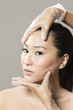 Chinese woman receiving Beauty Treatment.