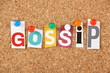 The word Gossip on a cork notice board