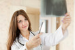 friendly doctor stares x-ray