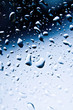 Raindrops on blue glass