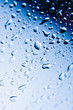 Raindrops on blue glass