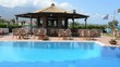 Video: The swimming pool near bar and Greek flag, Peloponnes, Greece The swimming pool near bar and Greek flag, Peloponnes, Greece