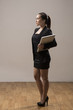 Stylish Chinese Businesswoman Carrying a Laptop