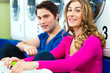 Photo: couple in a coin laundry washing couple in a coin laundry washing