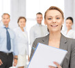 happy woman with big notepad