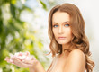 beautiful woman with rose petals