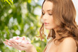 beautiful woman with rose petals