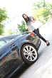 Photo: junge Frau mit Auto junge Frau mit Auto