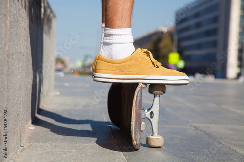 Photo: Skateboarders Feet Close Up Skateboarders Feet Close Up
