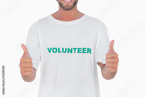 Photo: Man wearing volunteer tshirt giving thumbs up Man wearing volunteer tshirt giving thumbs up