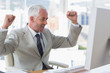 Businessman cheering