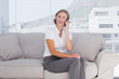 Pretty businesswoman talking on phone