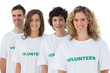 Four people wearing volunteer tshirt