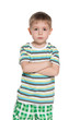 Photo: Serious little boy in striped shirt Serious little boy in striped shirt