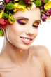Beautiful young woman with flower