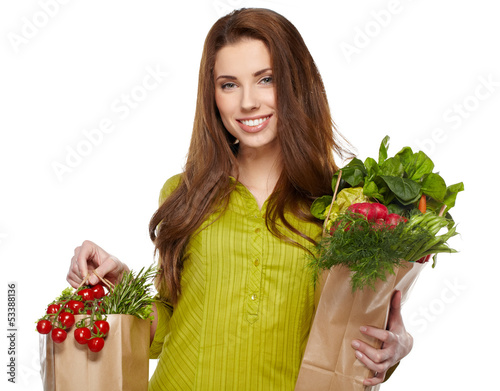 Photo: girl holding a bag of food girl holding a bag of food