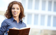 Young happy women or student on the property business background