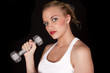 Photo: woman head and one weight white tank on black woman head and one weight white tank on black