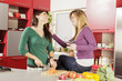 Young women in the kitchen