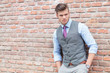 casual man with hands in pockets outdoor