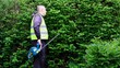 Landscape worker with an electric bush cutter episode 3