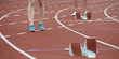 jambes de femmes devant les starting block