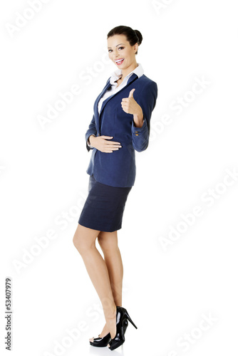 Photo: Happy business woman with ok gesture Happy business woman with ok gesture