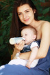 Photo: mother is feeding her baby mother is feeding her baby