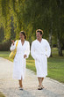 Young couple strolling the grounds of a spa