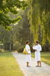 Young couple strolling the grounds of a spa