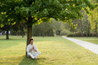 Young man meditating under a tree