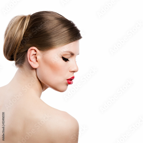 Photo: Lovely woman with retro makeup and hairstyle, isolated Lovely woman with retro makeup and hairstyle, isolated