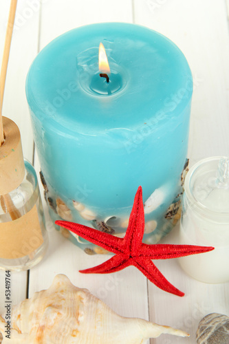 Photo: Sea spa composition on wooden table close-up Sea spa composition on wooden table close-up